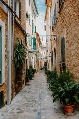 Obraz premium Narrow street in historic village in Spain.