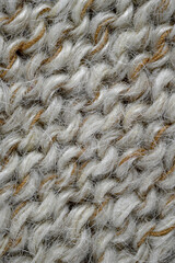 Grey, brown color wool knitted background closeup