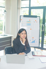 Shot of an attractive mature businesswoman working on laptop in her workstation.