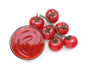 Bowl with tasty ketchup and fresh tomatoes isolated on white, top view