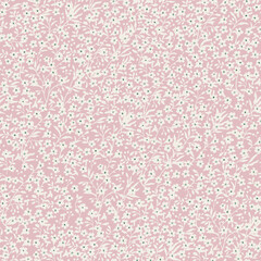 Spring floral pattern of silhouettes of white flowers on a pale pink background.