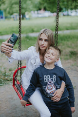 mother and child on swing