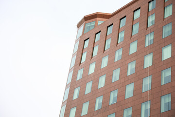 iconic brick building represents the enduring strength and stability of the business industry, symbolizing the passage of time and the financial success achieved through resilience and solid foundatio