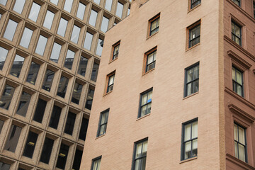modern building in the heart of the financial district, symbolizing progress and prosperity in the commercial real estate industry. Its large windows represent transparency and sleek design