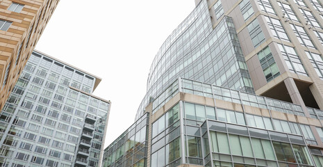 modern building in the heart of the financial district, symbolizing progress and prosperity in the commercial real estate industry. Its large windows represent transparency and sleek design