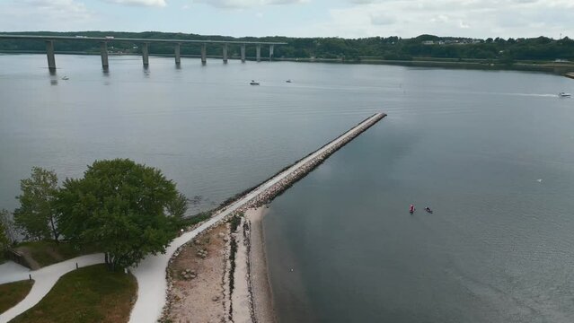 Vejle fjord highway bridge and Boelgen modern apartments, Denmark
