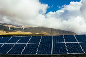 Solar panel industry in a mountain field concept for environmentally sustainable green energy. Sole...