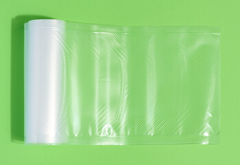 Roll with plastic film for vacuum packaging of products, hermetic packaging for vegetables and meat