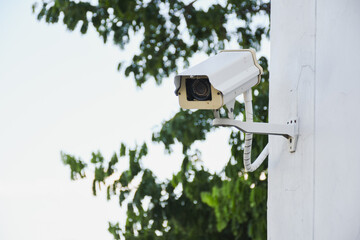security camera on a wall.