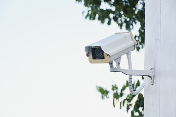 security camera on a wall.