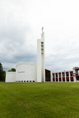 Vertical view of striking 1967 modern style white concrete Saint-Benoit-Abbé church located at 3420 Rochambeau street, Ste-Foy sector, Quebec City, Quebec, Canada
