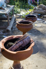 Incense Holder (dhupdani) Before Ancient Idol of God which are kept near roadside after puja...