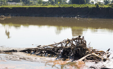 Remnants of Devotion: Abandoned Idol After Immersion, Only Bamboo Structure Remains