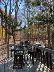 Tables and chairs outdoor dining in autumn