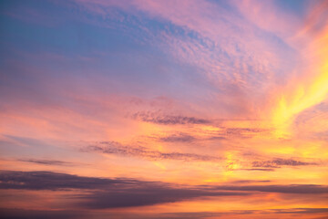 beautiful , luxury soft gradient orange gold clouds and sunlight on the blue sky perfect for the background, take in everning,Twilight