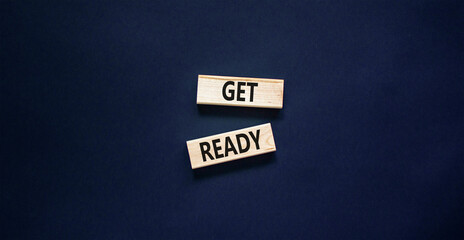 Get ready symbol. Concept words Get ready on wooden blocks on a beautiful black table black background. Business, support, motivation and get ready concept. Copy space.