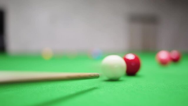 Close up of Snooker shooting on snooker table and balls in slow motion
