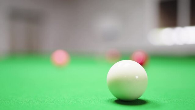 Close up of Snooker shooting on snooker table and balls in slow motion
