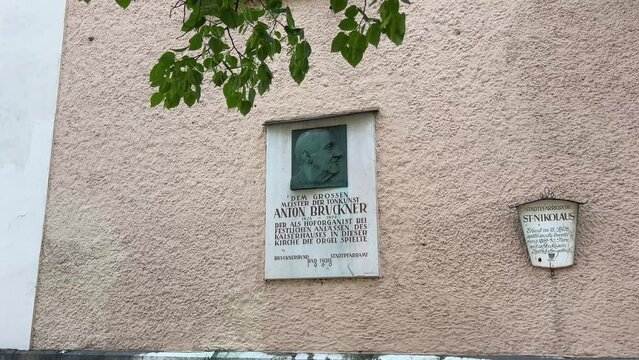 plaque in memory of composer Anton Bruckner on parish church Bad Ischl