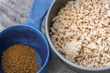 Homemade backpacking meal with dried meat, rice, peanuts and coffee.