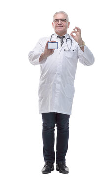 in full growth. qualified doctor showing his visiting card