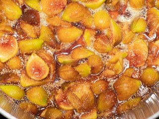 Closeup of figs on the stove top to be made into preserves.