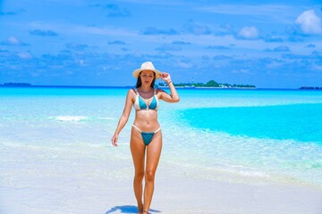 woman on the sandbank in maldives, maldives beach shooting 