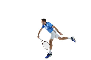 Active man in blue shirt and white shorts, tennis player in motion, training, playing isolated over white background. Concept of sport, active lifestyle, game, hobby, health, dynamics, ad