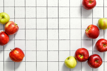 Apples. Fresh juicy red and green apple fruits on kitchen table, copy space, top view