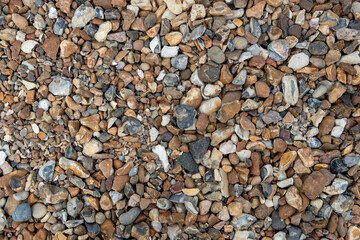 Beautiful and colourful sea pebbles on the beach. Nature stone colourful  background