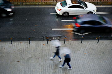 People and traffic in a rainy day in Istanbul from high angle view