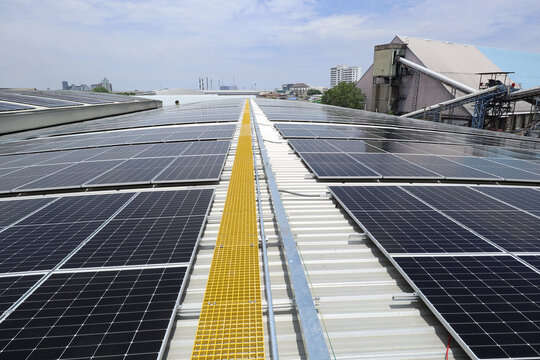 Solar PV on Factory Roof with Yellow Fiberglass Walkway