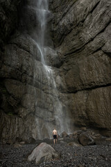 person in a waterfall