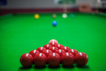 Snooker balls set on a grean cloth table