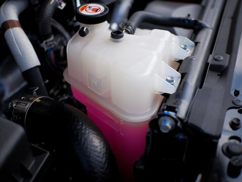 radiator reservoir tank car engine coolant anti-coolant and anti-freeze, pink coolant