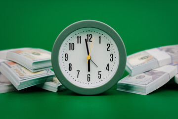Dollar, savings and clock in a glass jar. Investment. Financial stock. Financial income. Salary....