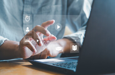 Businessman touching a virtual screen with his hands for online streaming watch videos on the internet online webinars internet education e-learning concept