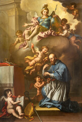 GENOVA, ITALY - MARCH 7, 2023: The painting of St. Francis de Sales and St. Michael archangel in the church Santuario di San Franceso da Paola by Francesco Campora (1693 - 1763).