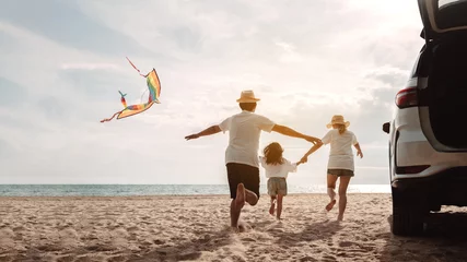 Foto op Plexiglas Family happy traveling enjoy in vacation with Car travel driving road trip summer vacation in car in the sunset, Dad, mom and daughter  holidays and relaxation together get the atmosphere. © Kiattisak