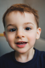 Emotions on the face of a two-year-old little boy, an emotional child. A boy with different grimaces on his face.