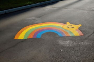 Childrens Drawing On The Asphalt With The Sun And Rainbow. Generative AI
