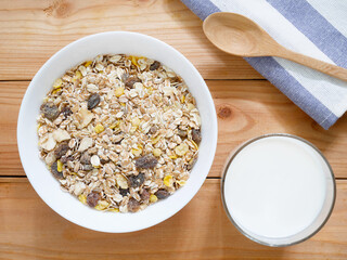 A Bowl of muesli breakfast and rolled oats with dried fruits