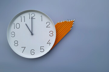 11 o'clock. Study time. Back to school. Watch with white clock face on blue table background with...