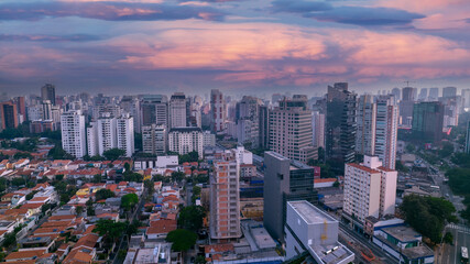 Fototapeta na wymiar Residential buildings and houses in the Itaim Bibi neighborhood in São Paulo, Brazil. Aerial view of Ibirapuera Park with buildings in the background.