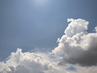 Cumulonimbus clouds in the radiant sky at noon