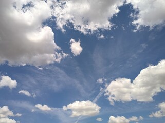 Cumulus with some cirrocumulus at noon