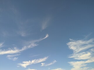 Cirrus clouds in the blue sky in the afternoon