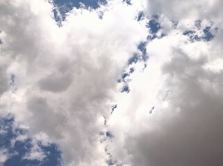 Cumulus clouds spread in the blue sky