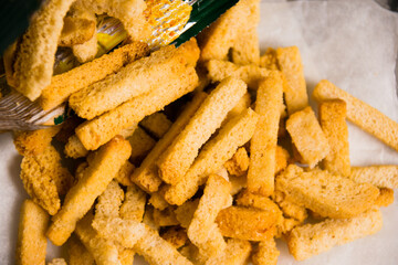 Aromatic salty crackers with the taste of mushrooms from rye bread macro. A tasty snack for beer.