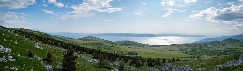 Fototapeta na wymiar View of the Adriatic Sea with its islands from the Croatian mountains.